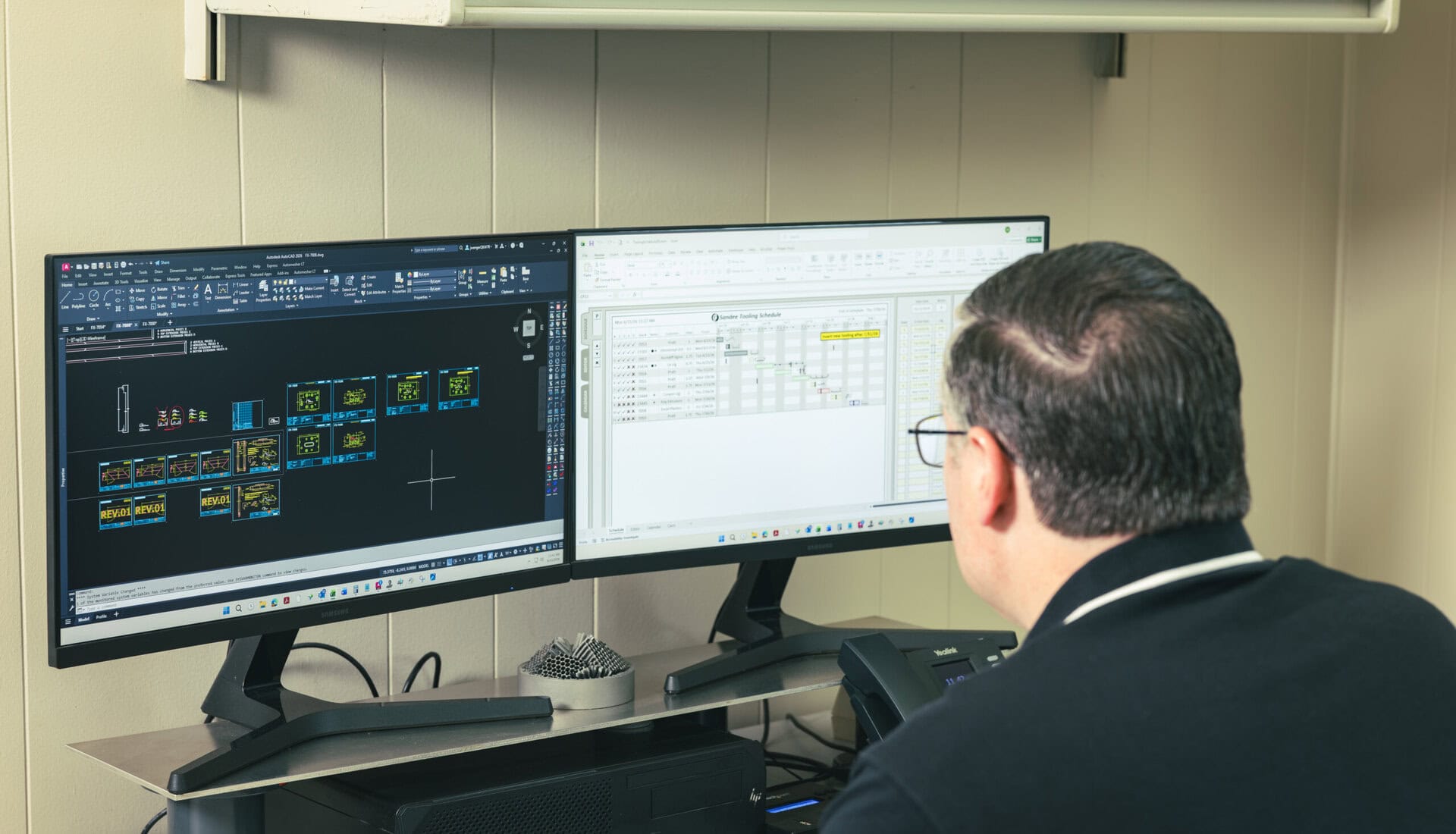 Computer with AutoCAD opened showcasing designs